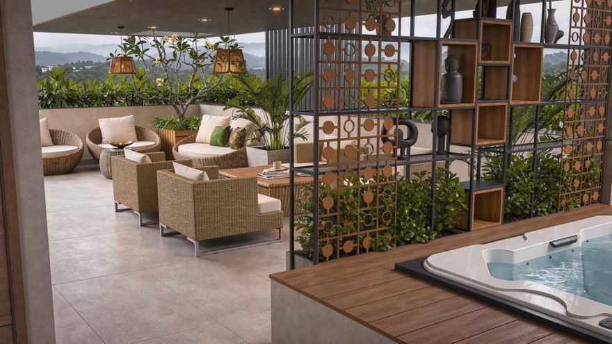Roof terrace seating area with a decorative screen, display shelving and jacuzzi beyond